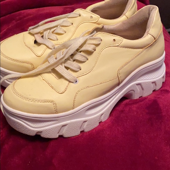 pastel yellow sneakers